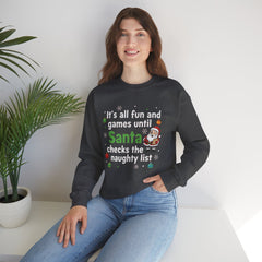 Christmas Sweatshirt — "It's all fun and games until Santa checks the naughty list" Cozy Holiday Gildan Crewneck
