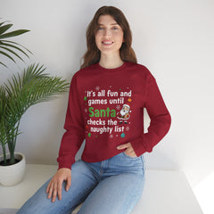 Christmas Sweatshirt — "It's all fun and games until Santa checks the naughty list" Cozy Holiday Gildan Crewneck