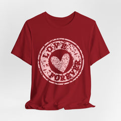 Heart Stamp Tee — Pink 'Love More' Graphic T-Shirt
