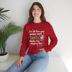 Christmas Sweatshirt — "It's all fun and games until Santa checks the naughty list" Cozy Holiday Gildan Crewneck
