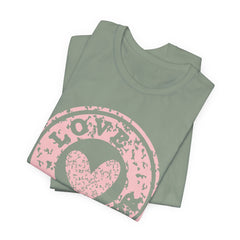 Heart Stamp Tee — Pink 'Love More' Graphic T-Shirt