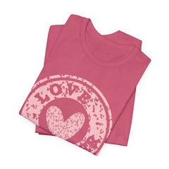 Heart Stamp Tee — Pink 'Love More' Graphic T-Shirt