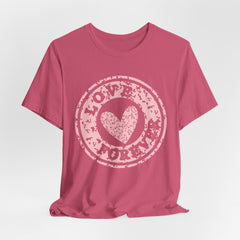 Heart Stamp Tee — Pink 'Love More' Graphic T-Shirt