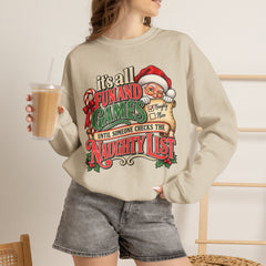 Christmas Sweatshirt — "It's all fun and games until Santa checks the naughty list" Cozy Holiday Gildan Crewneck