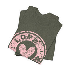 Heart Stamp Tee — Pink 'Love More' Graphic T-Shirt