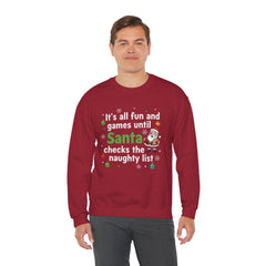 Christmas Sweatshirt — "It's all fun and games until Santa checks the naughty list" Cozy Holiday Gildan Crewneck