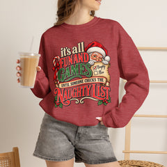Christmas Sweatshirt — "It's all fun and games until Santa checks the naughty list" Cozy Holiday Gildan Crewneck