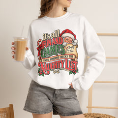 Christmas Sweatshirt — "It's all fun and games until Santa checks the naughty list" Cozy Holiday Gildan Crewneck