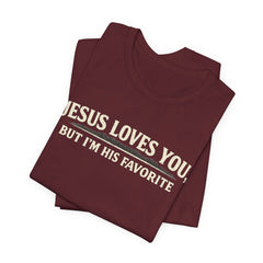 Jesus Loves You Tee — “But I’m His Favorite” Christian Graphic T-Shirt