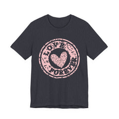 Heart Stamp Tee — Pink 'Love More' Graphic T-Shirt