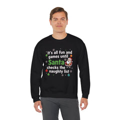 Christmas Sweatshirt — "It's all fun and games until Santa checks the naughty list" Cozy Holiday Gildan Crewneck