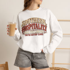 Southern Hospitality Crewneck Sweatshirt — "Southern Hospitality Has Its Limits, You're Gettin' Close"