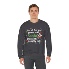 Christmas Sweatshirt — "It's all fun and games until Santa checks the naughty list" Cozy Holiday Gildan Crewneck