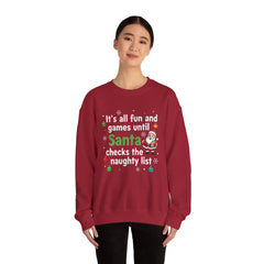 Christmas Sweatshirt — "It's all fun and games until Santa checks the naughty list" Cozy Holiday Gildan Crewneck