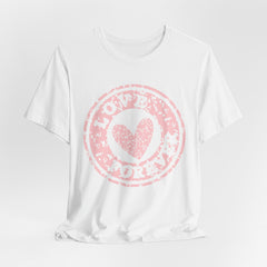 Heart Stamp Tee — Pink 'Love More' Graphic T-Shirt